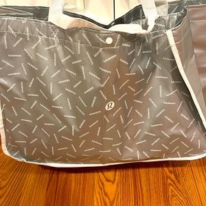 Lululemon bag over the shoulder wide bag with bonus snall black lululemon bag